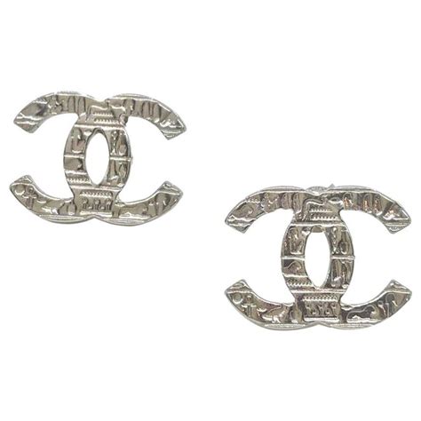 chanel egyptian earrings|Chanel ring earrings.